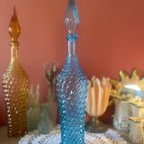 Large turquoise bottle