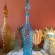 Large turquoise bottle