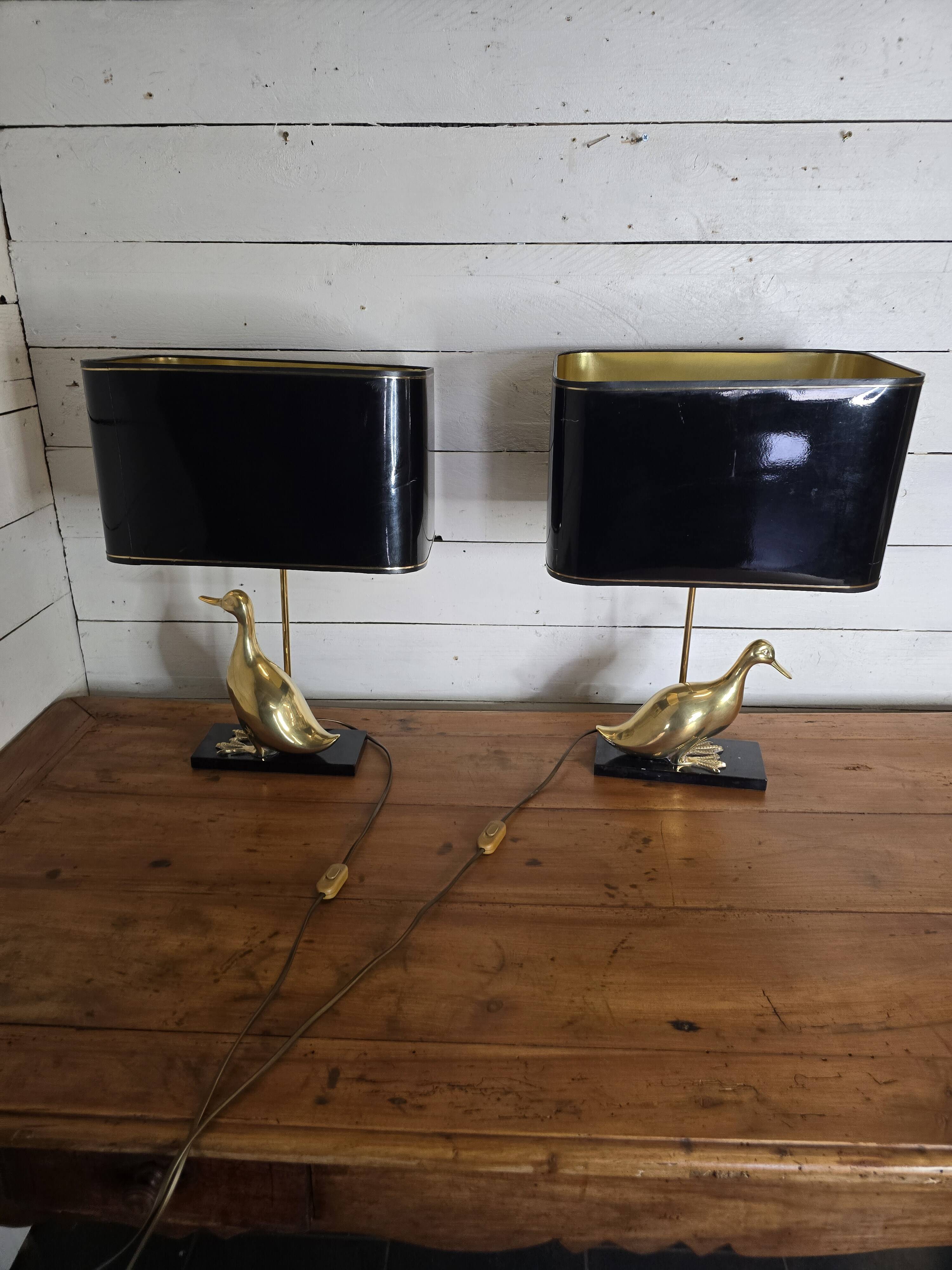 Pair of 70s table lamps featuring a brass duck