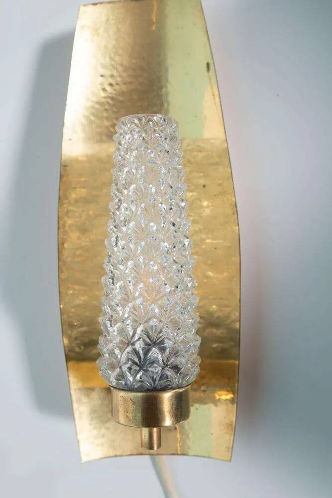 Vintage glass wall sconce from the 1960s in brass, mid-century light.
