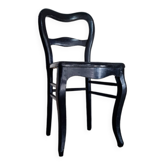 Chaise ancienne en bois courbé noir et assise cannage