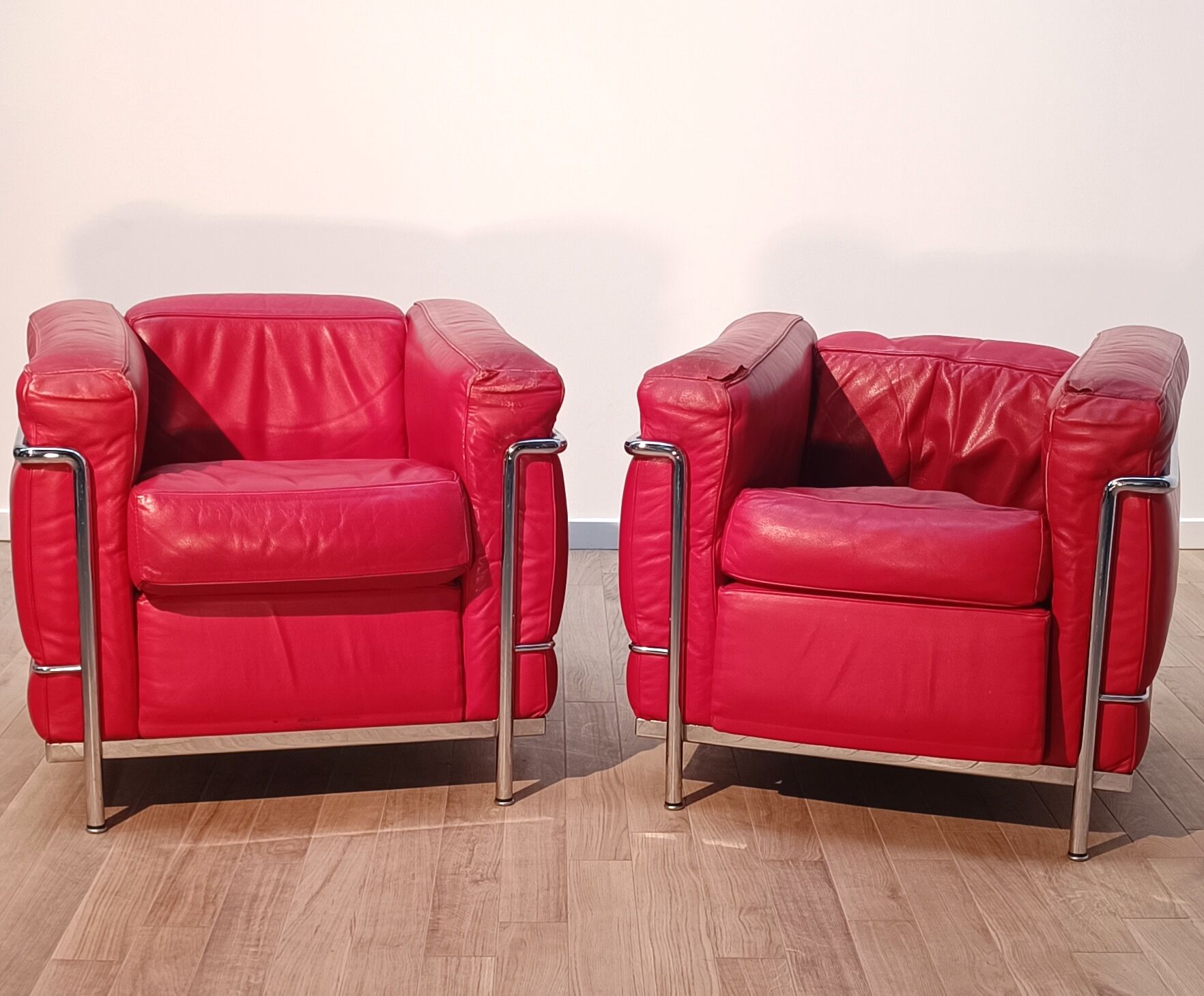 Pair of LC2 armchairs, Le Corbusier for Cassina