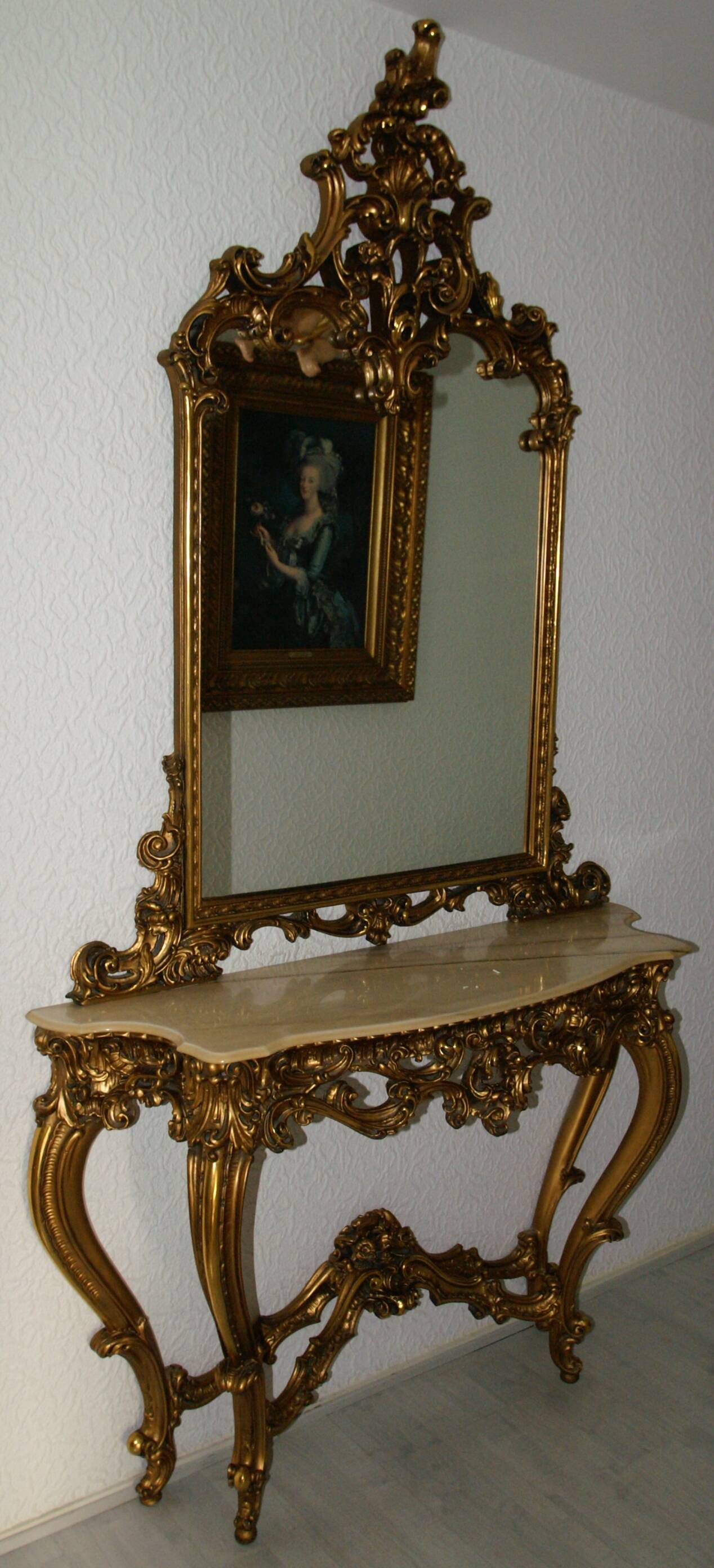 Mirror set with baroque style gilded wood console on marble top.
