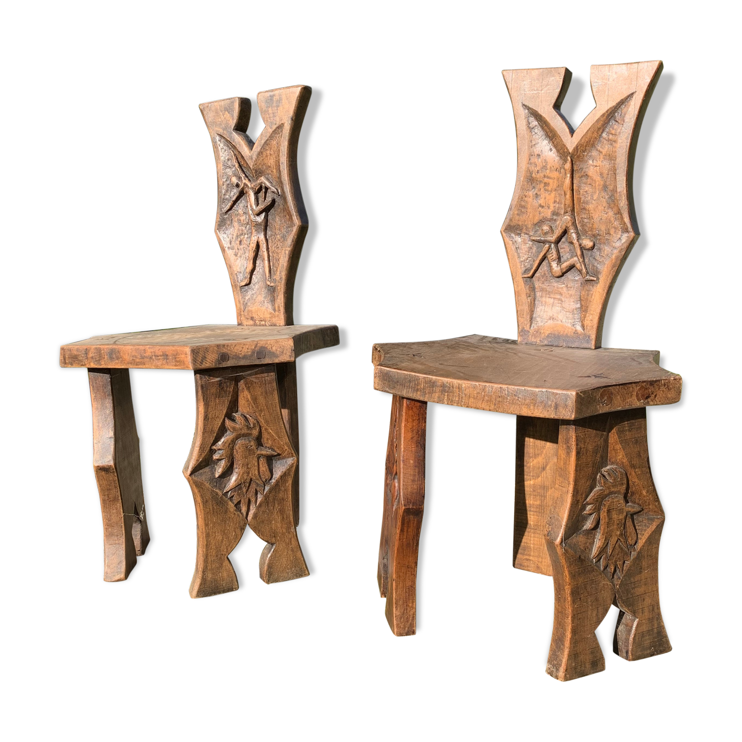 2 solid wood Johnny Ludecher folk art chairs