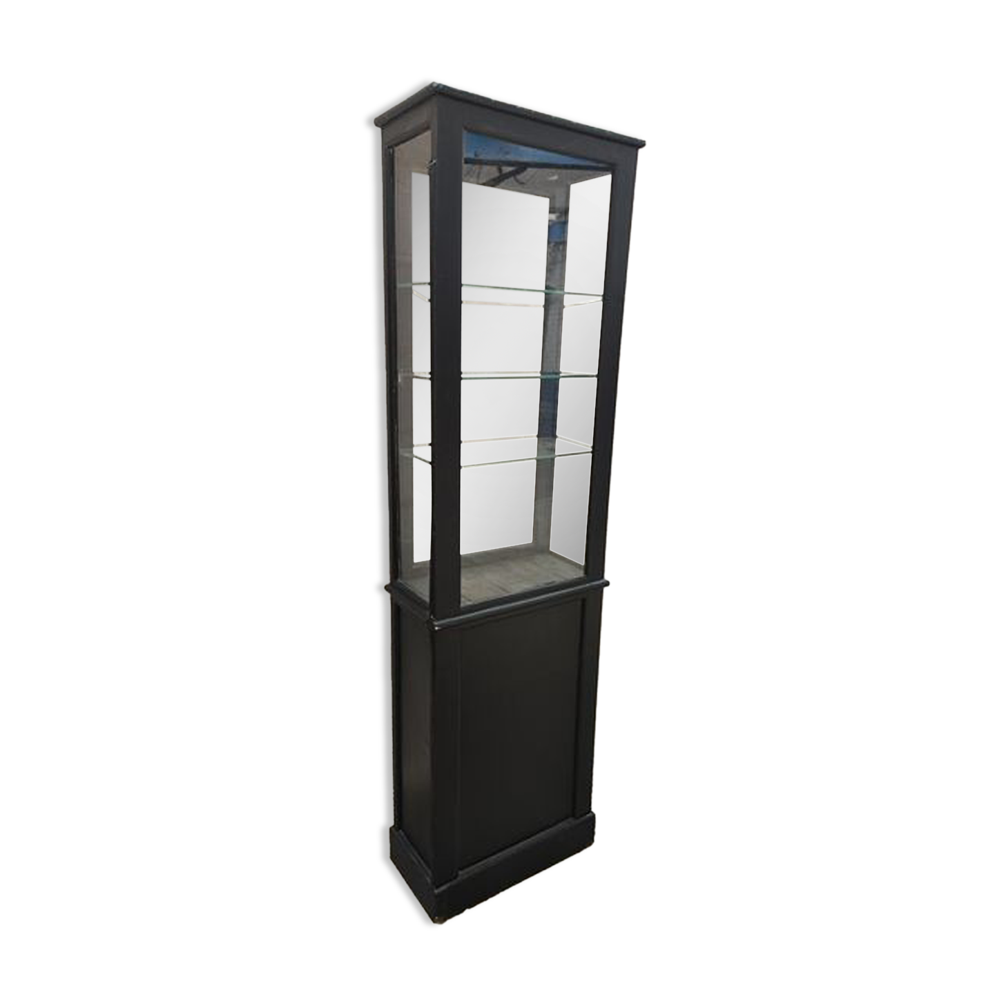 Old wooden window of black patina store two doors