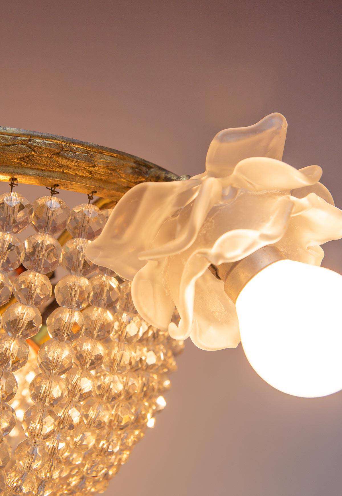 Old bronze ceiling light and 3 tulip flowers