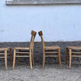 Series of 4 chairs in vintage light wood beech