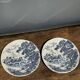 Set of 2 earthenware plates with blue decoration of a bridge and castle