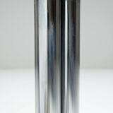 Round sidetable with stone top and three chromed legs