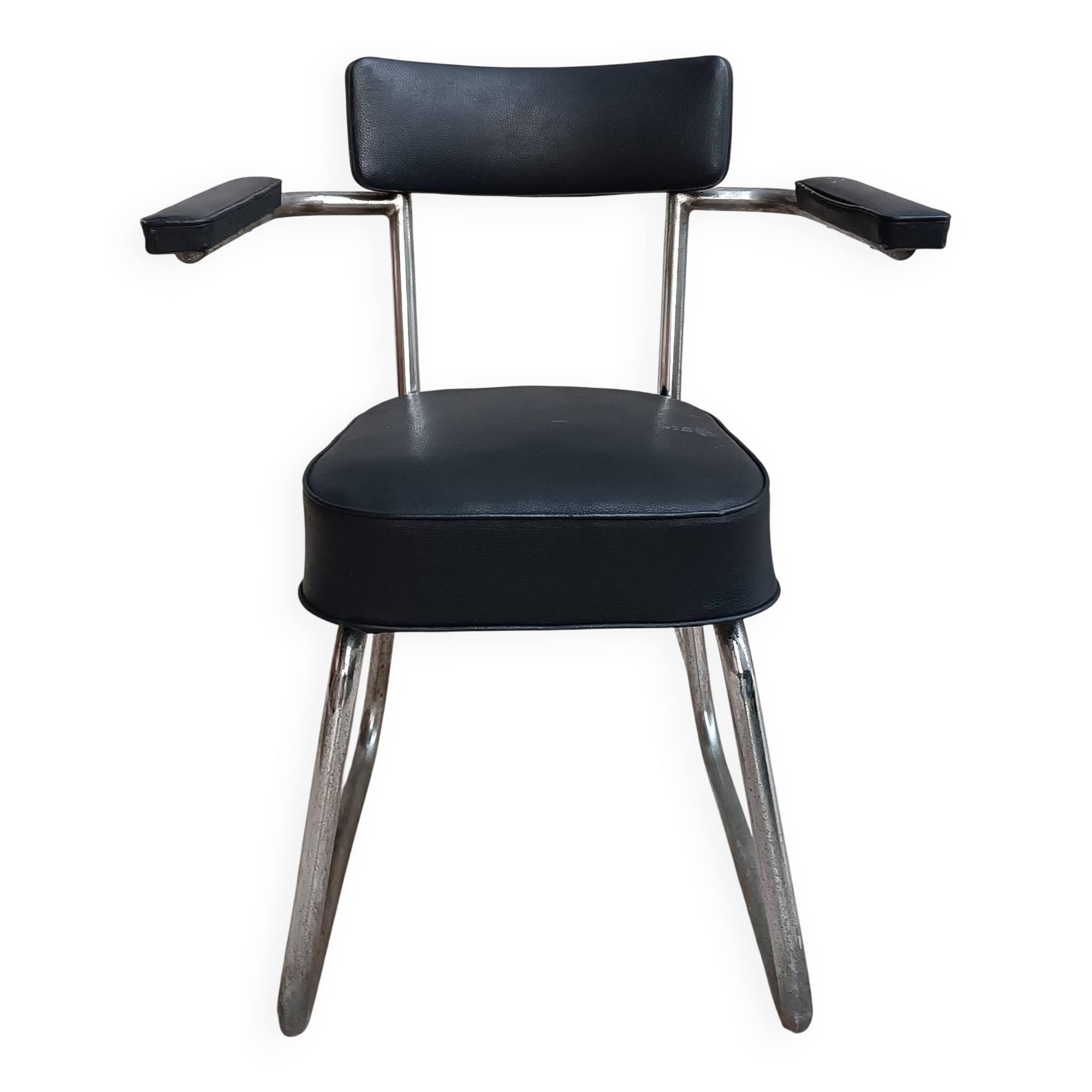 Vintage office chair in chrome metal and faux leather.
