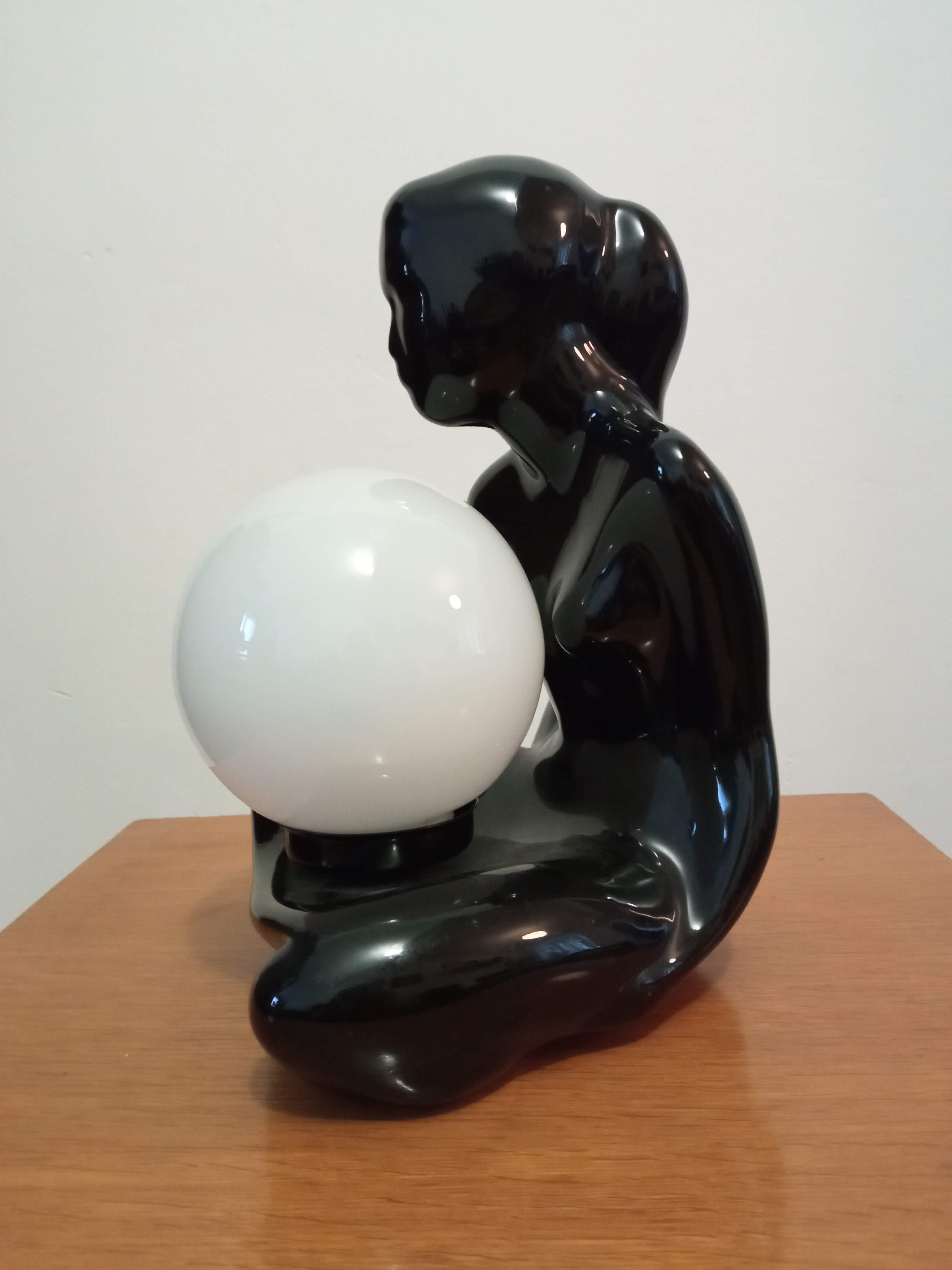 Lamp black ceramic and opaline globe circa 1970