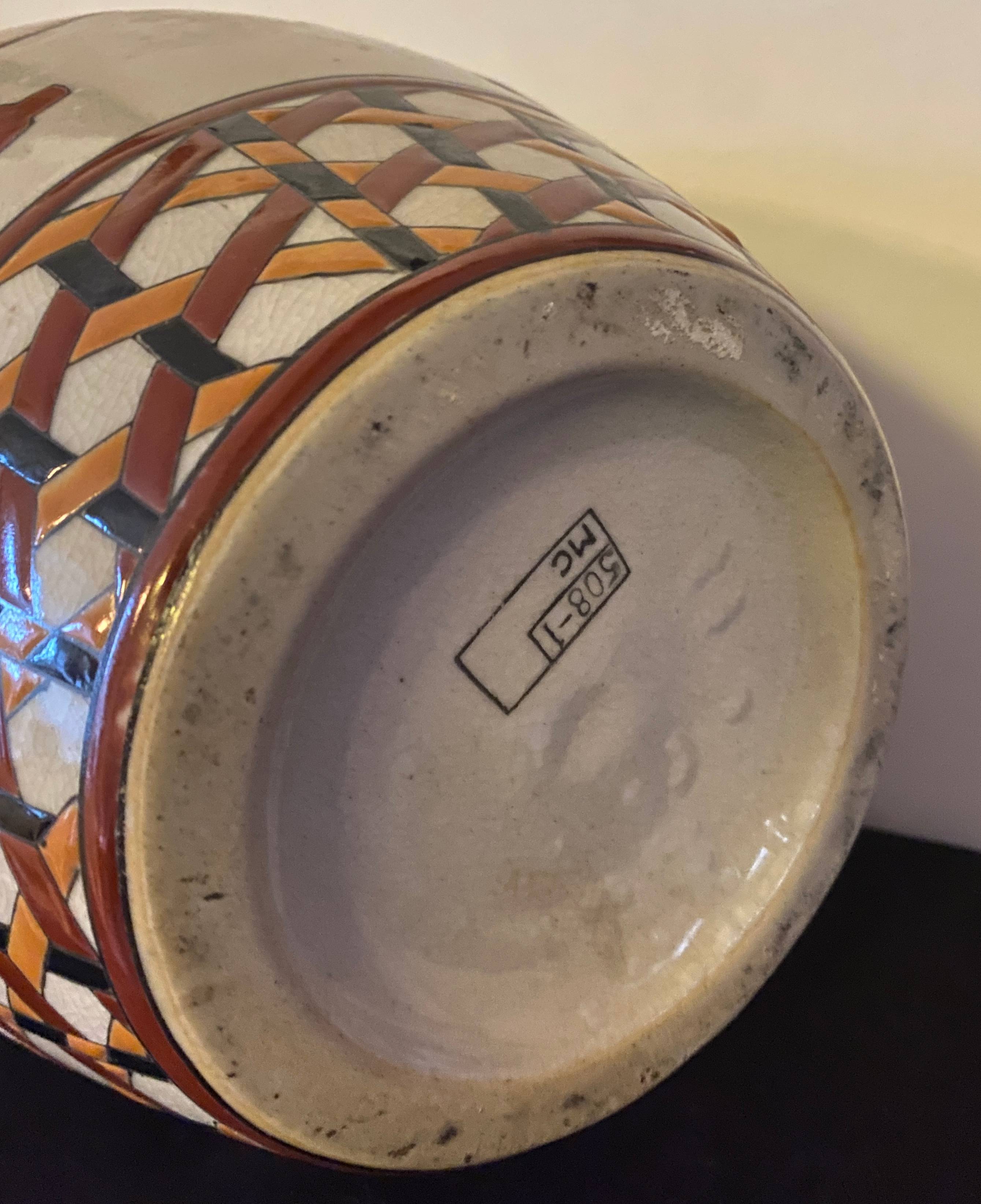 Art deco vase with monkey motifs and Keralouve palm leaf