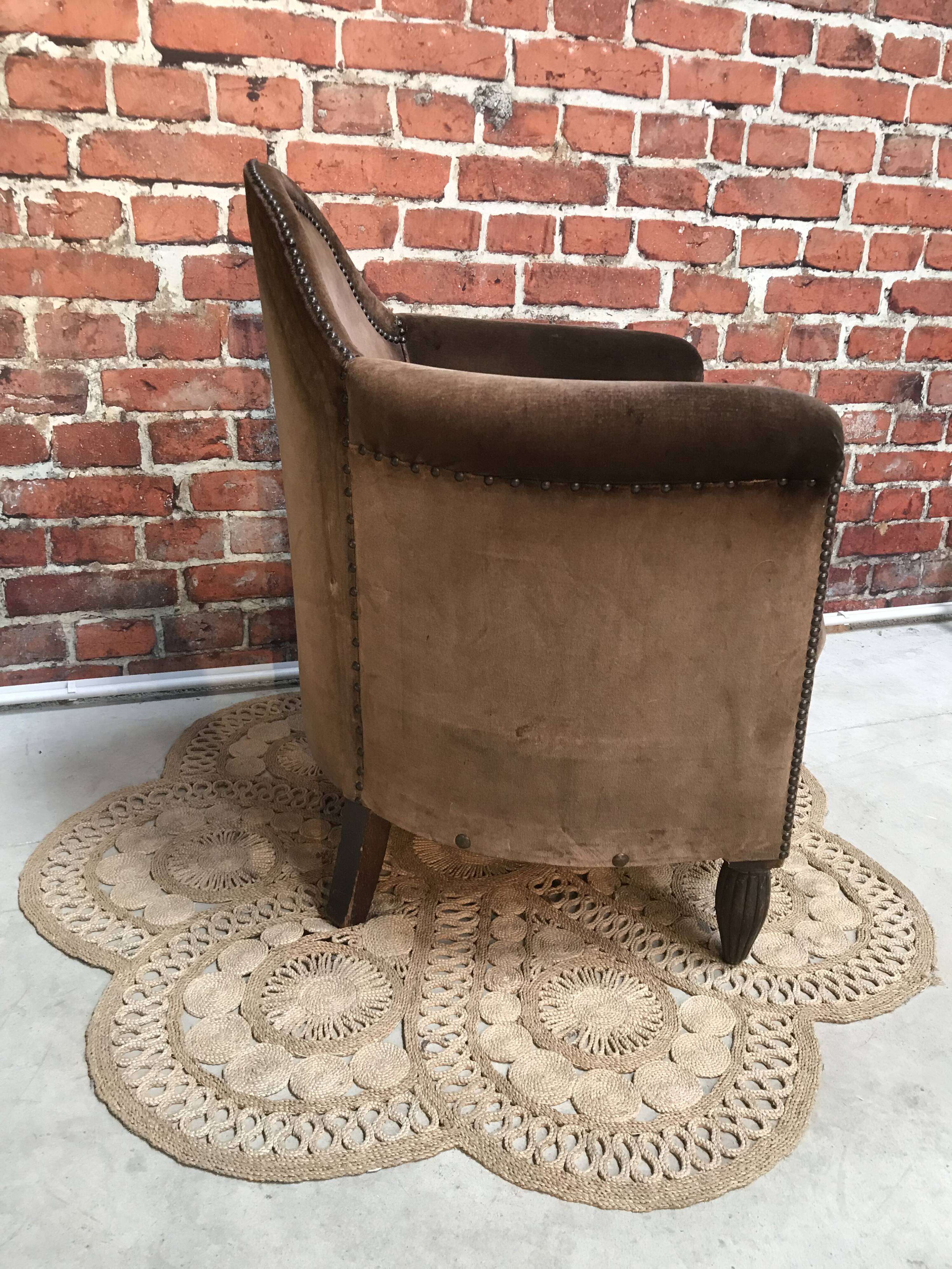 Club armchair in brown fabric