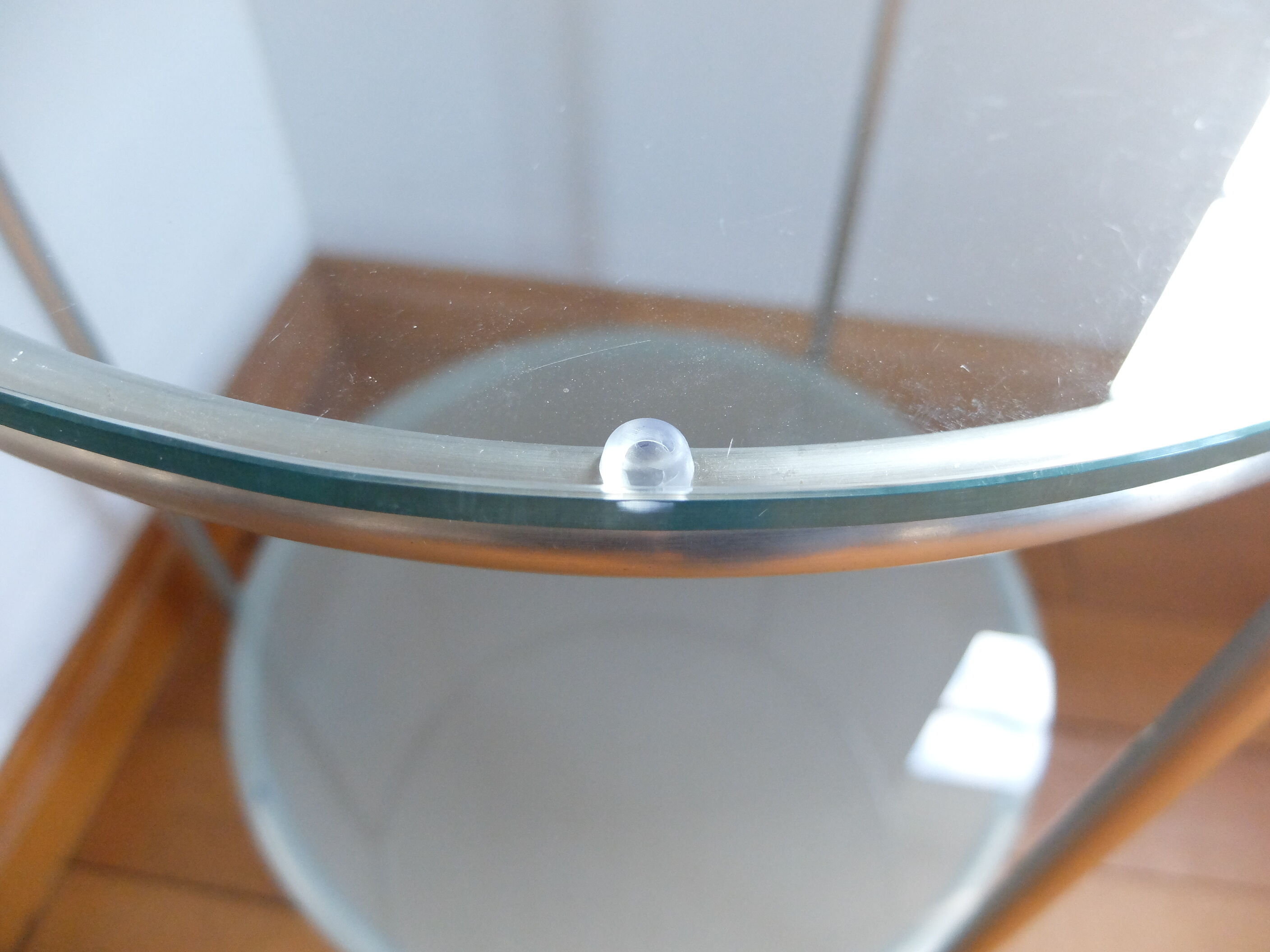 1970s stainless steel pedestal table with two glass tops