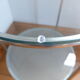 1970s stainless steel pedestal table with two glass tops