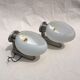 Pair of brushed steel appliques, half-egg opaline, 1970