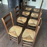 Set of 8 wooden chairs with rattan seats from the 1950s