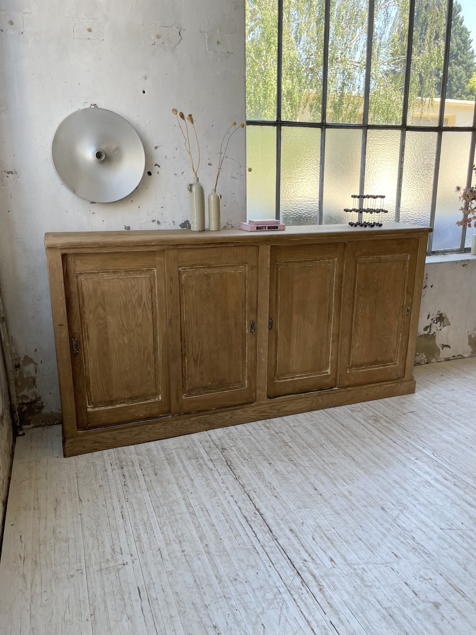 Large row of solid oak loom sliding doors