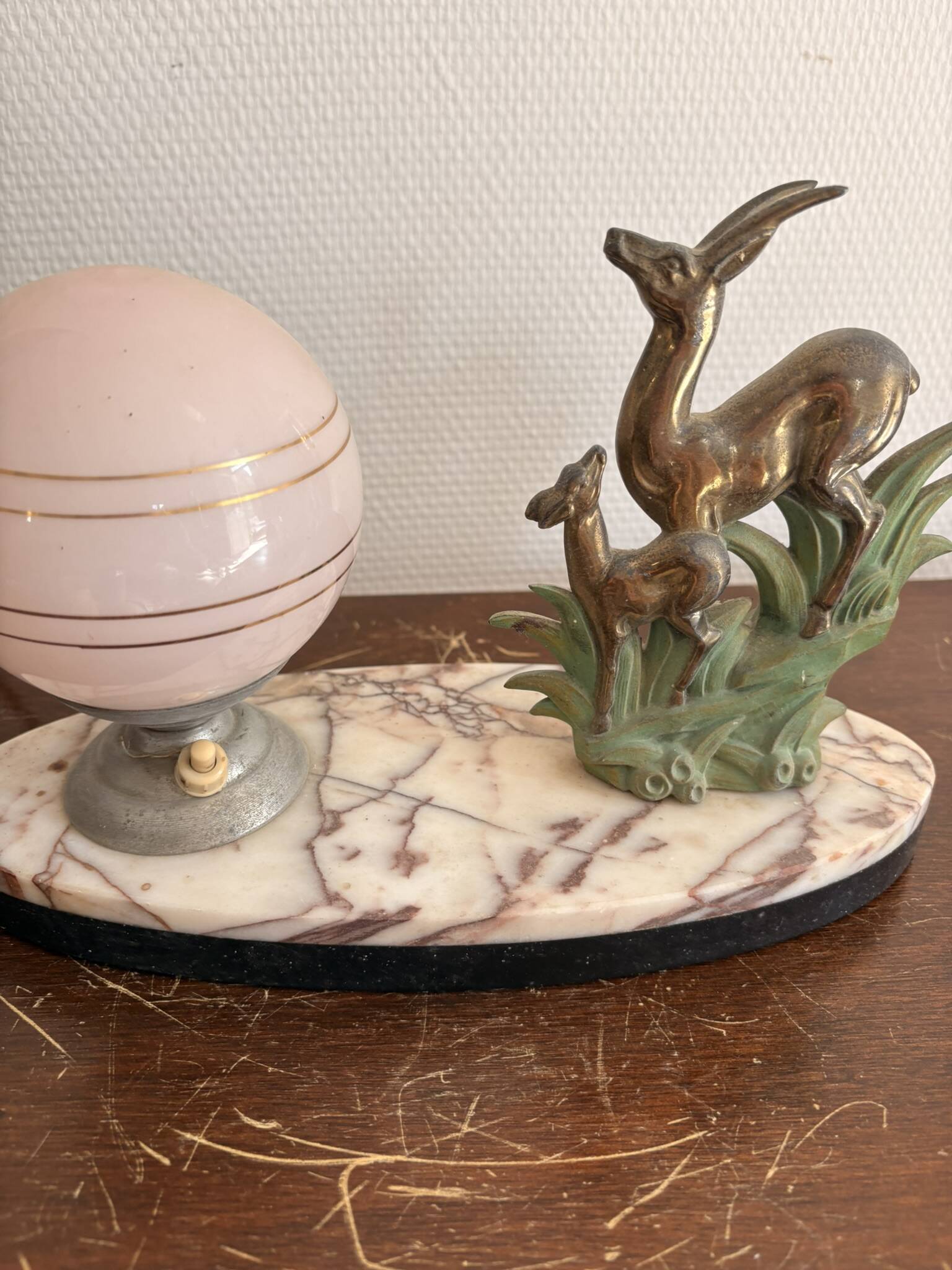 Antique Art Deco table lamp in marble and pink glass featuring a deer.