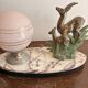 Antique Art Deco table lamp in marble and pink glass featuring a deer.