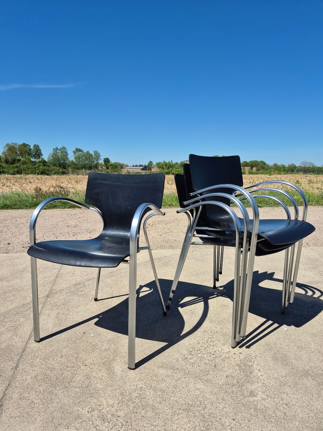 Set 4 postmodern black chrome stackable chair Jim for Kens 1990s