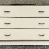 Cabinet and chest of drawers in ivory lacquer, inspired by Mahey and Vandel.