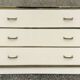 Cabinet and chest of drawers in ivory lacquer, inspired by Mahey and Vandel.