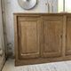 Large row of solid oak loom sliding doors