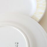 Five dessert plates from the 50s