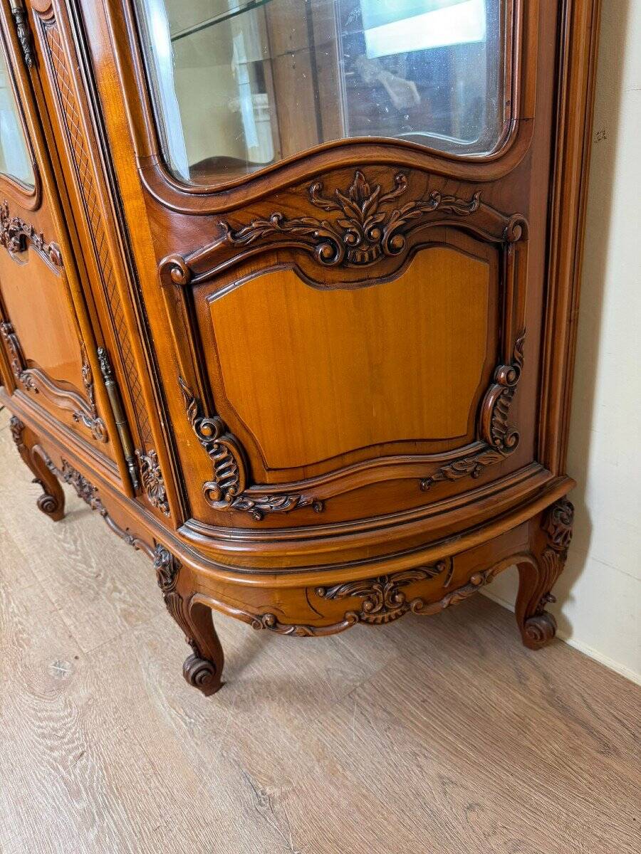 Louis XV Provençal style bookcase in half-moon shape in cherry wood circa 1930