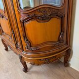 Bibliothèque style louis XV provençale de forme demi lune en merisier vers 1930