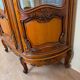 Louis XV Provençal style bookcase in half-moon shape in cherry wood circa 1930