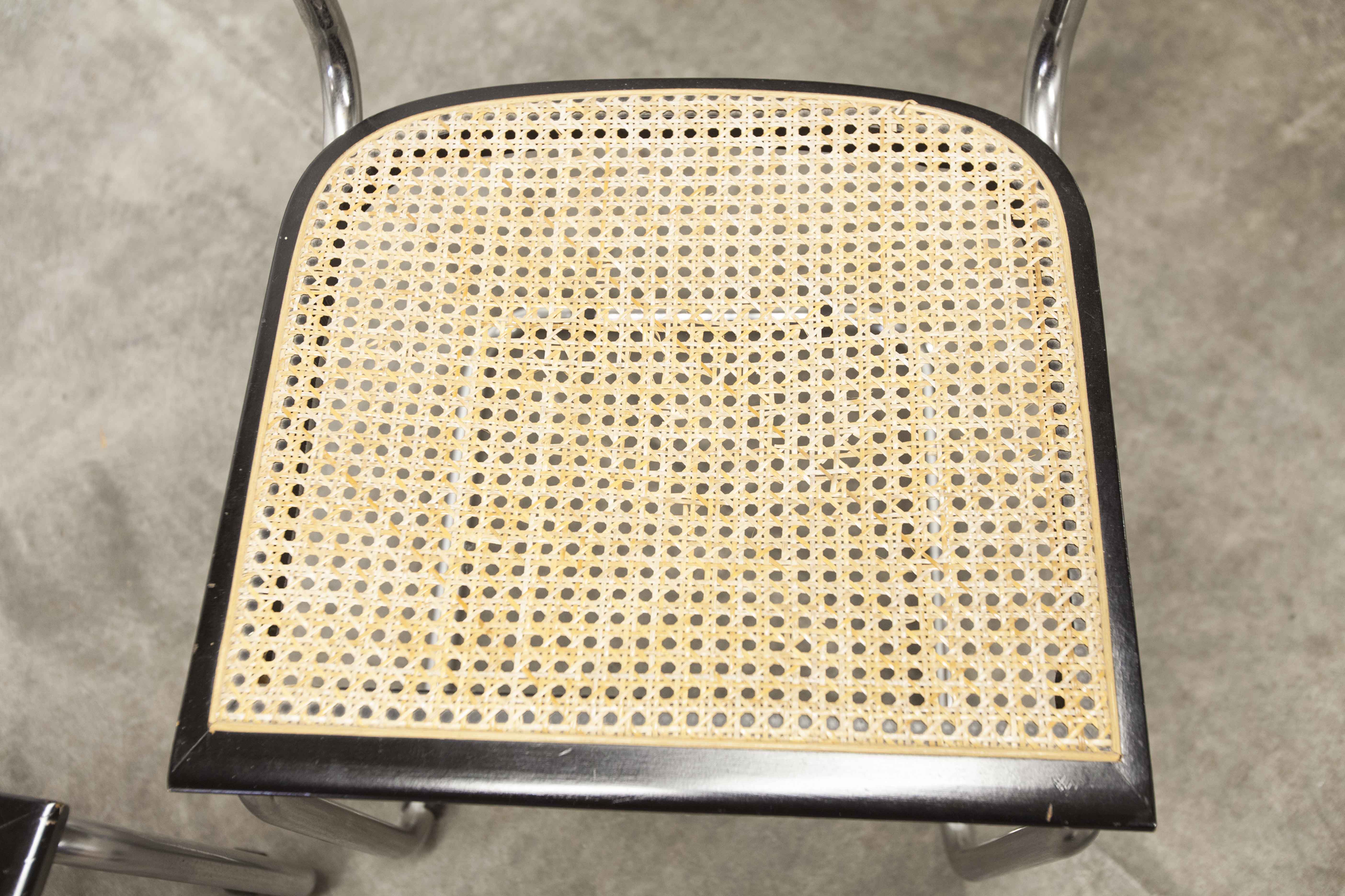 Pair of black Breuer b32 chairs and cannage