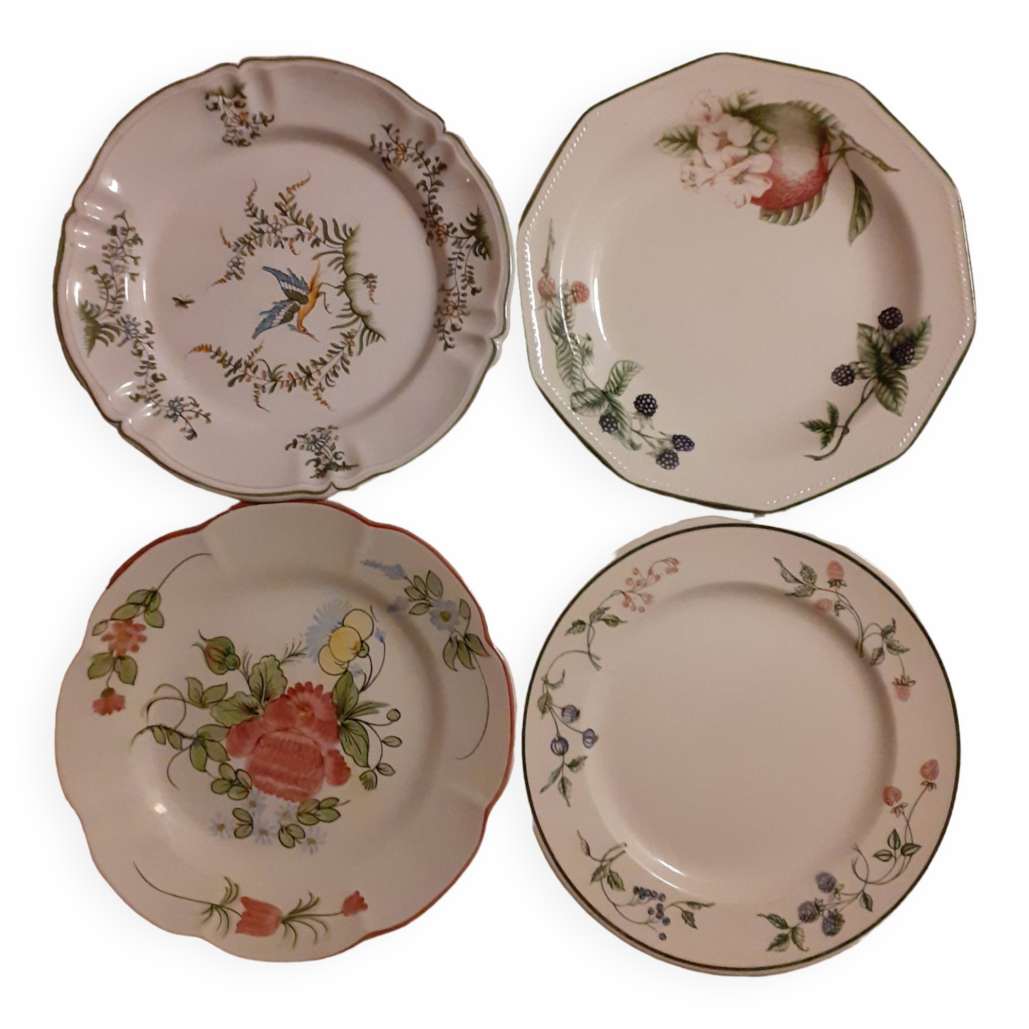 Set of four retro fruit and flower flat plates from Moustiers...