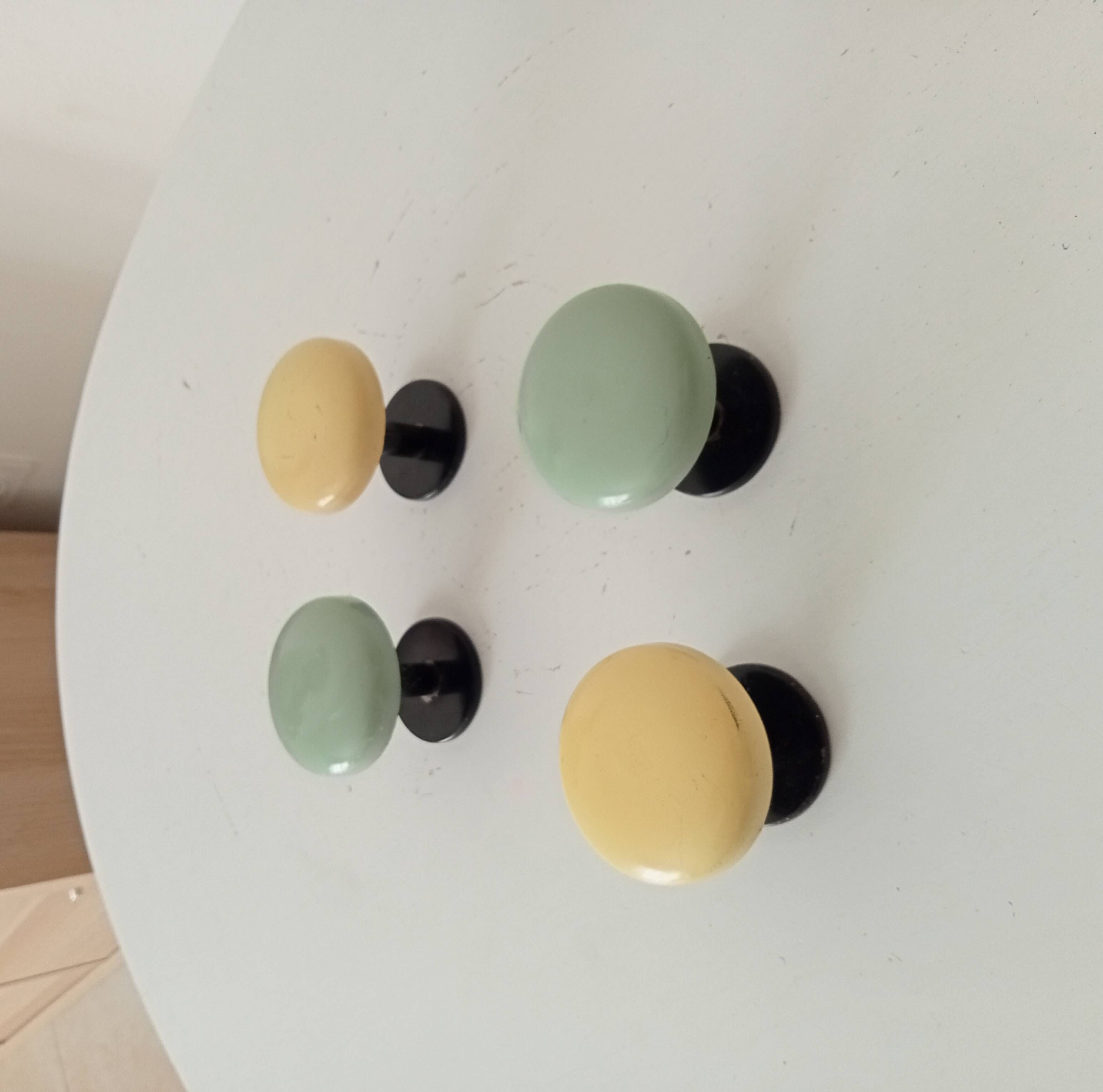 Set of 4 vintage coat hooks from the 1960s.