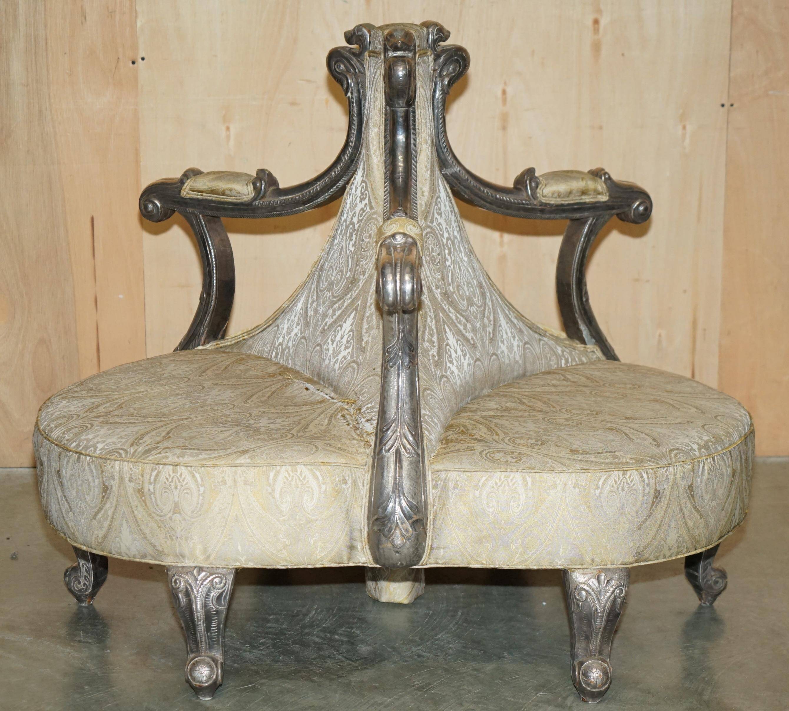 Silver-plated sculpted "Tete a Tete" canapé conversation, antique 19th century.