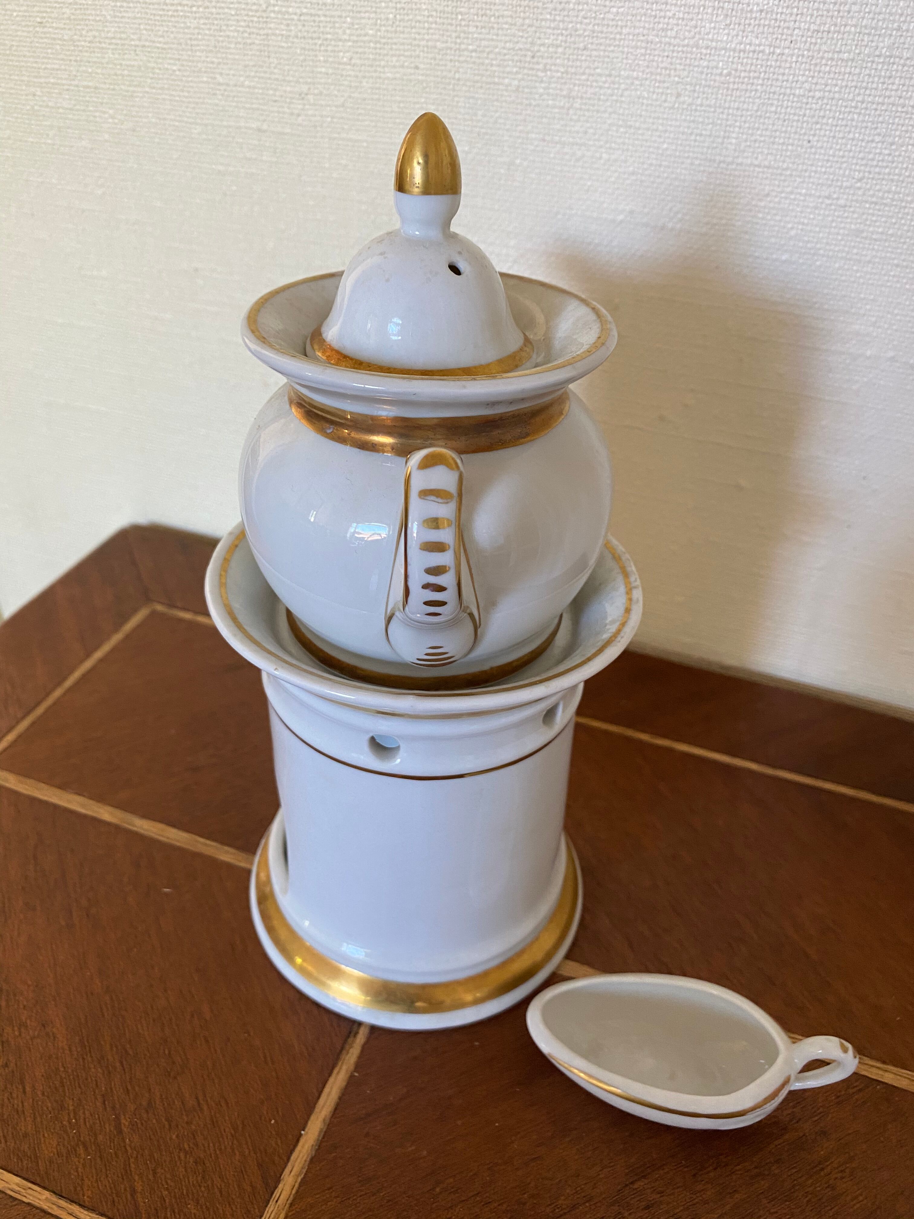 Porcelain teapot with stove