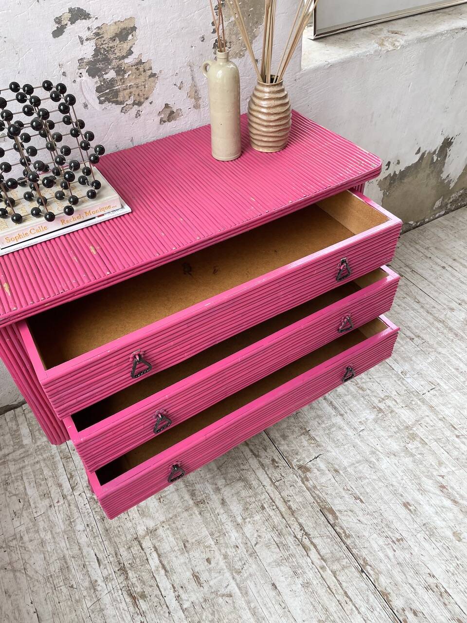 Vintage pink rattan chest of drawers