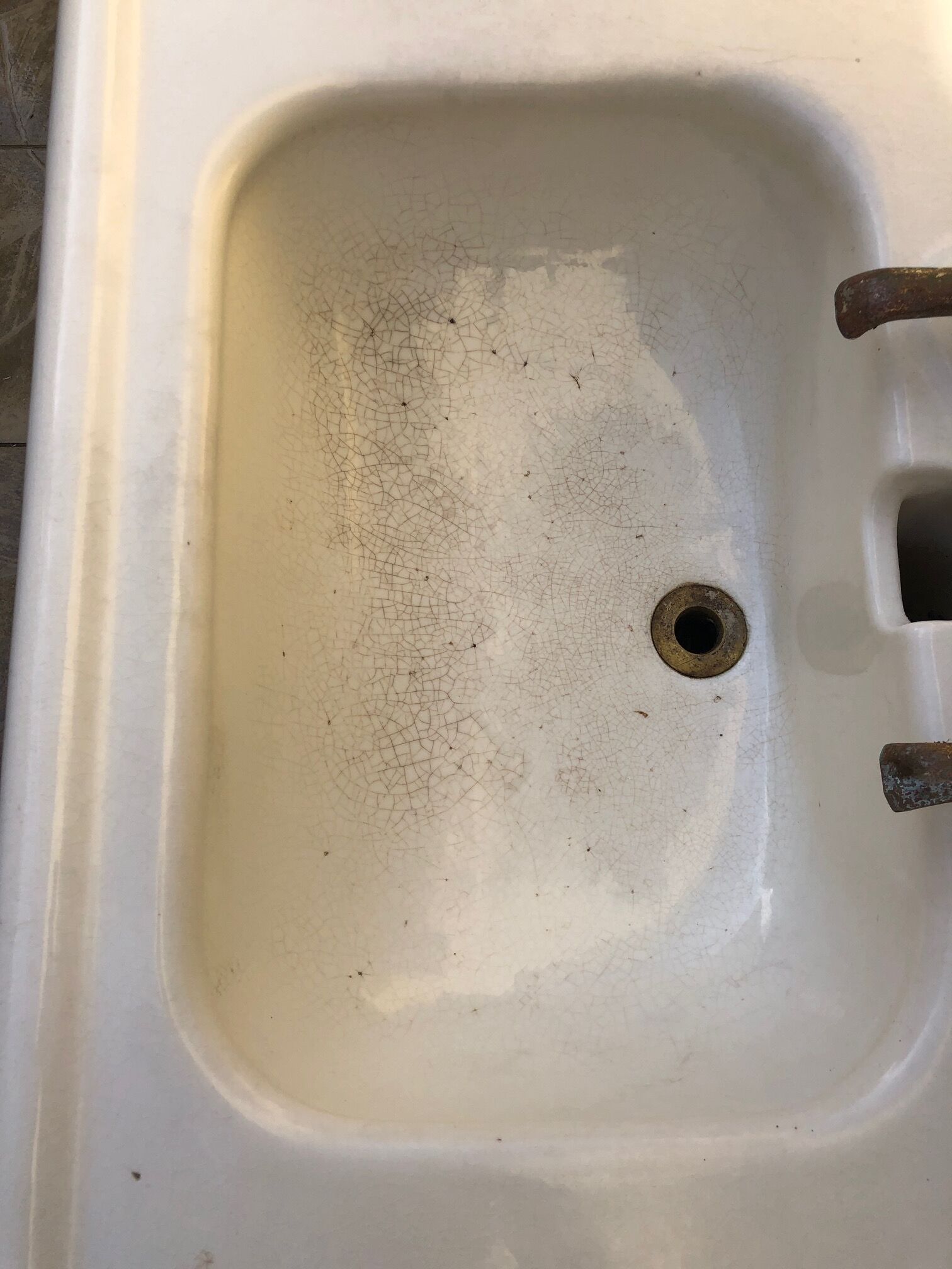 Antique washbasin on ceramic column