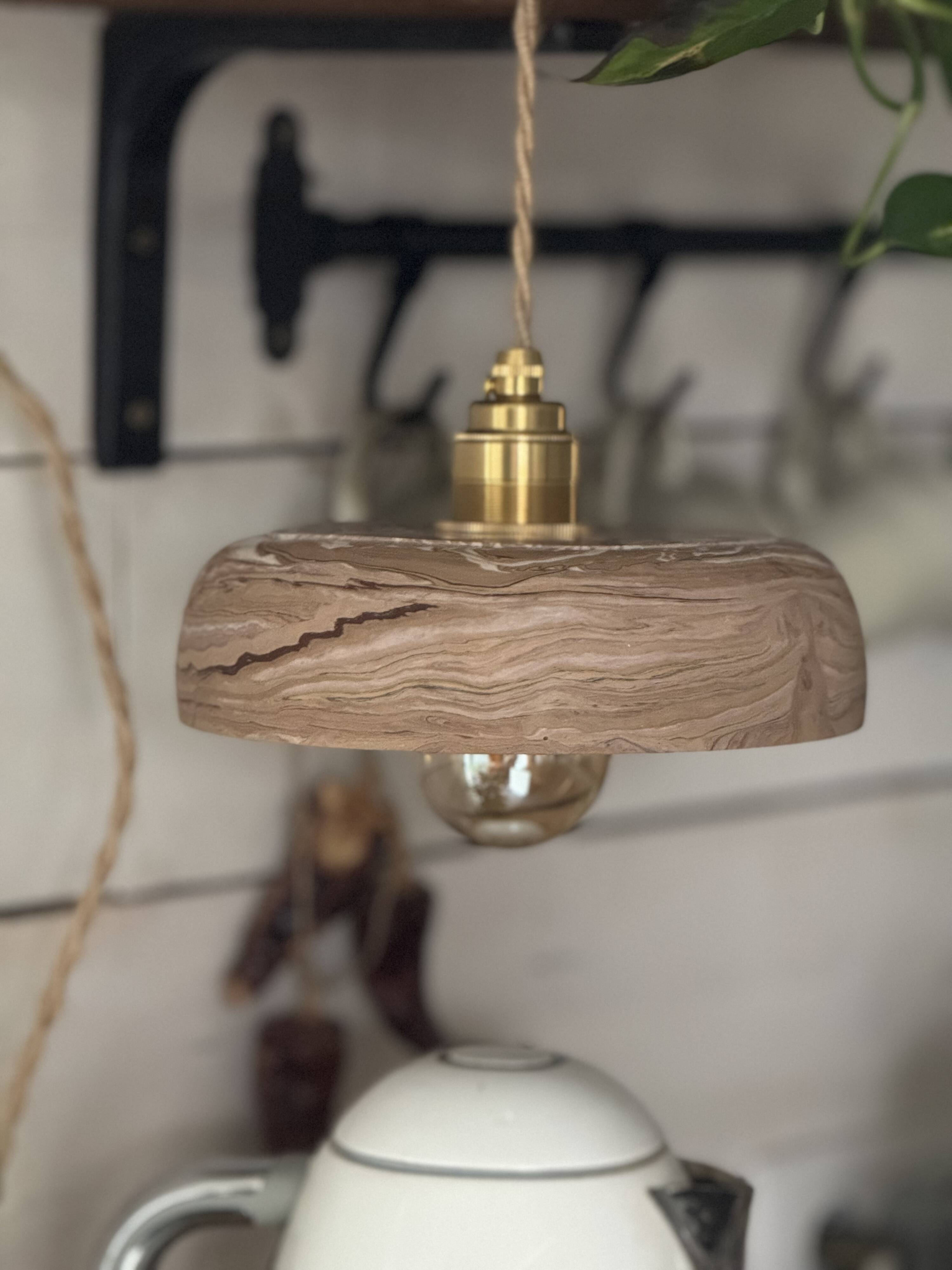 Handcrafted portable lamp with a marbled stone effect