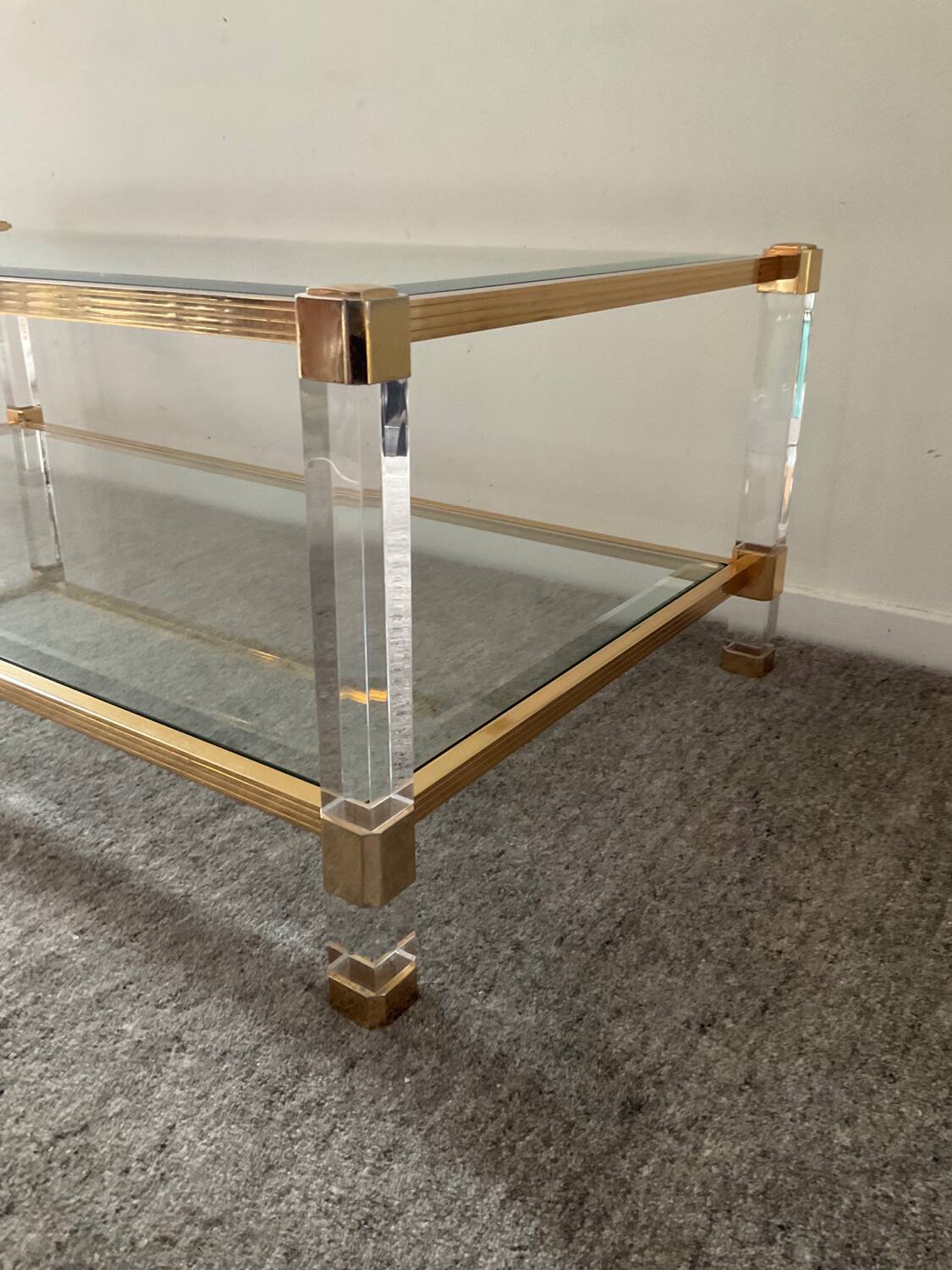 Vintage lucite and brass coffee table from the 70s