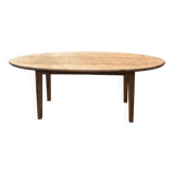 Oval solid wood dining table