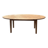 Oval solid wood dining table