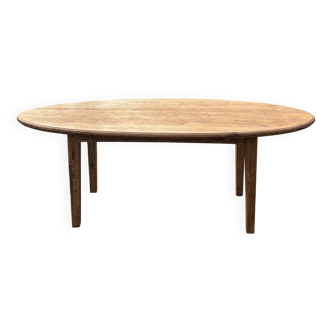 Oval solid wood dining table