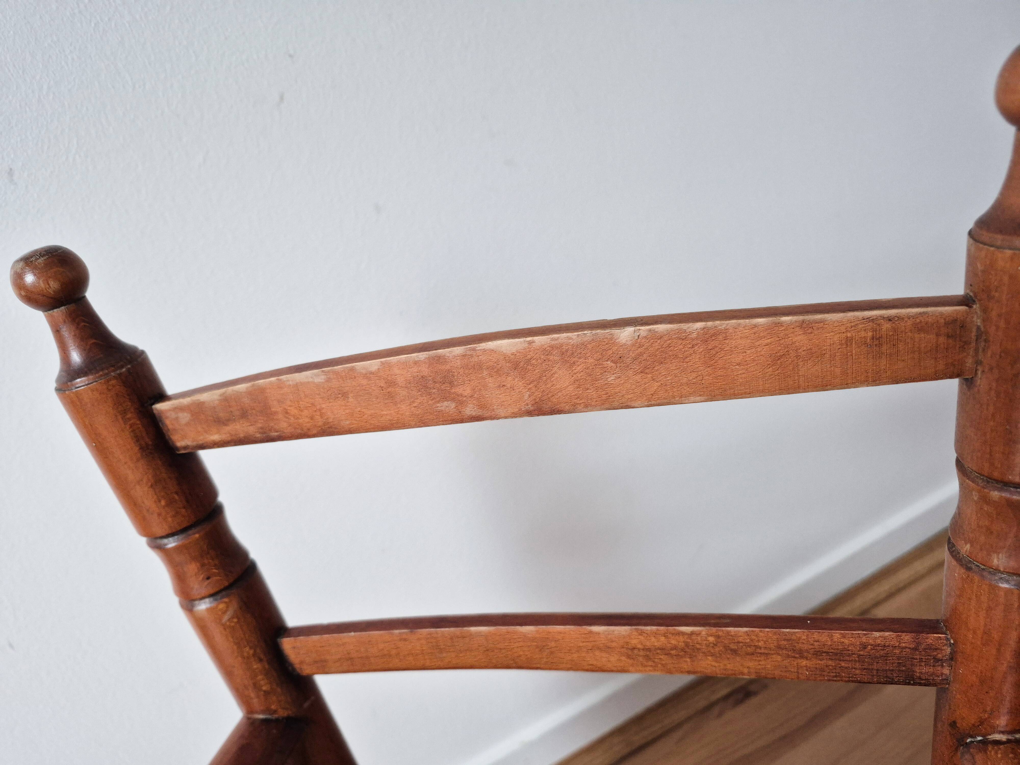 Vintage wooden and straw children's armchair