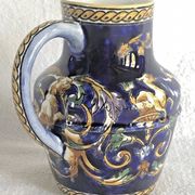 Old cream jug Gien Renaissance blue background 1938/1960