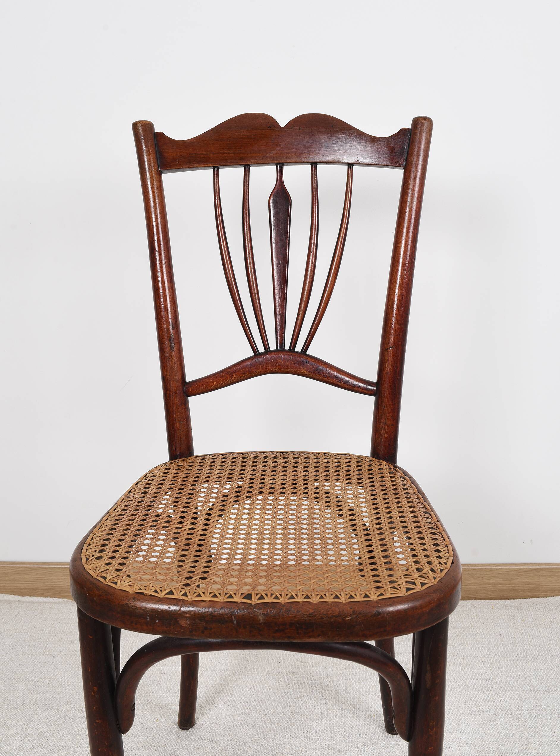 Old cane bistro chair, stamped fischel