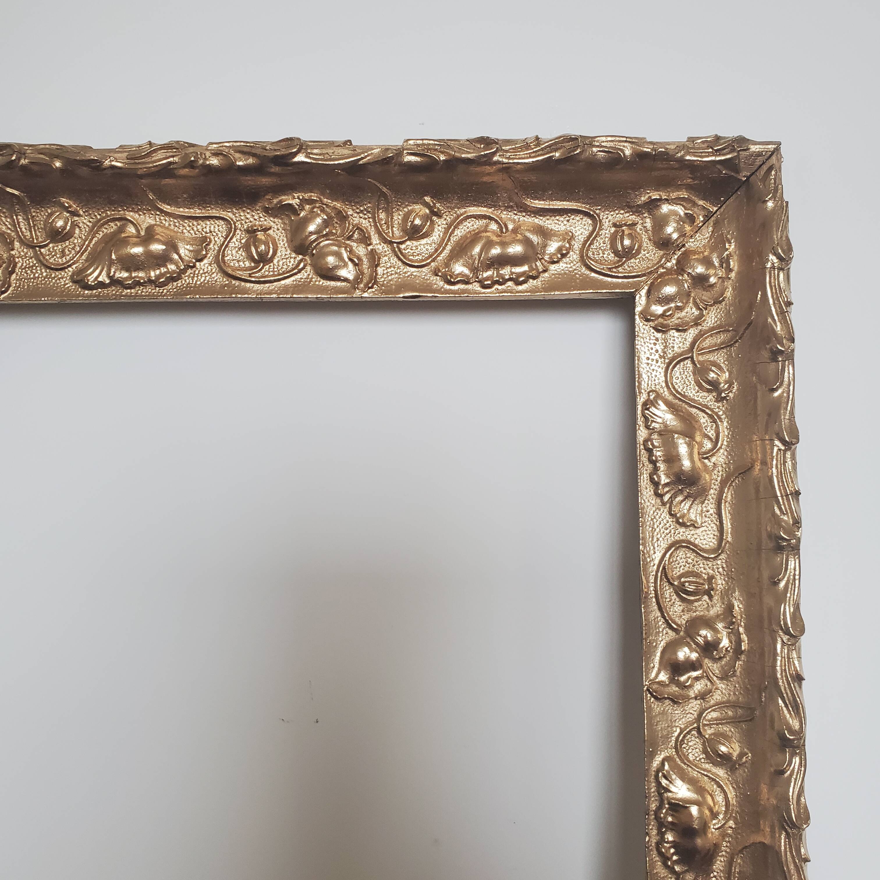 Large old gilded wooden frame