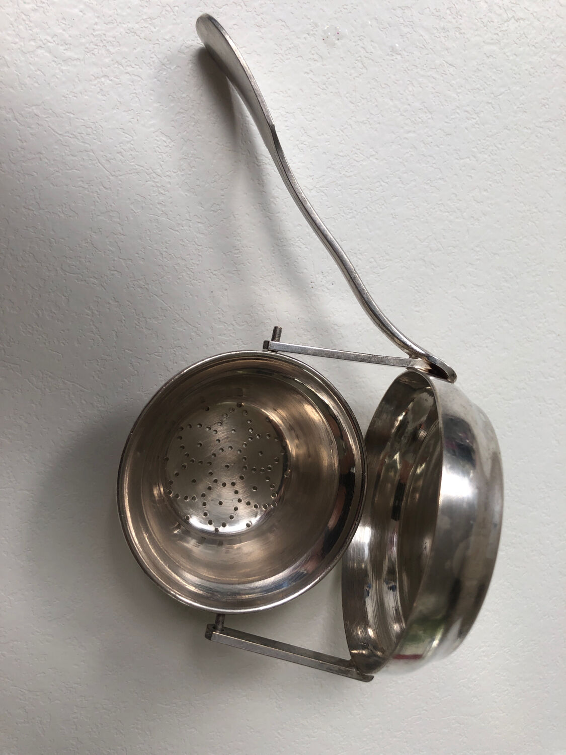 Silver Rocking Tea Strainer