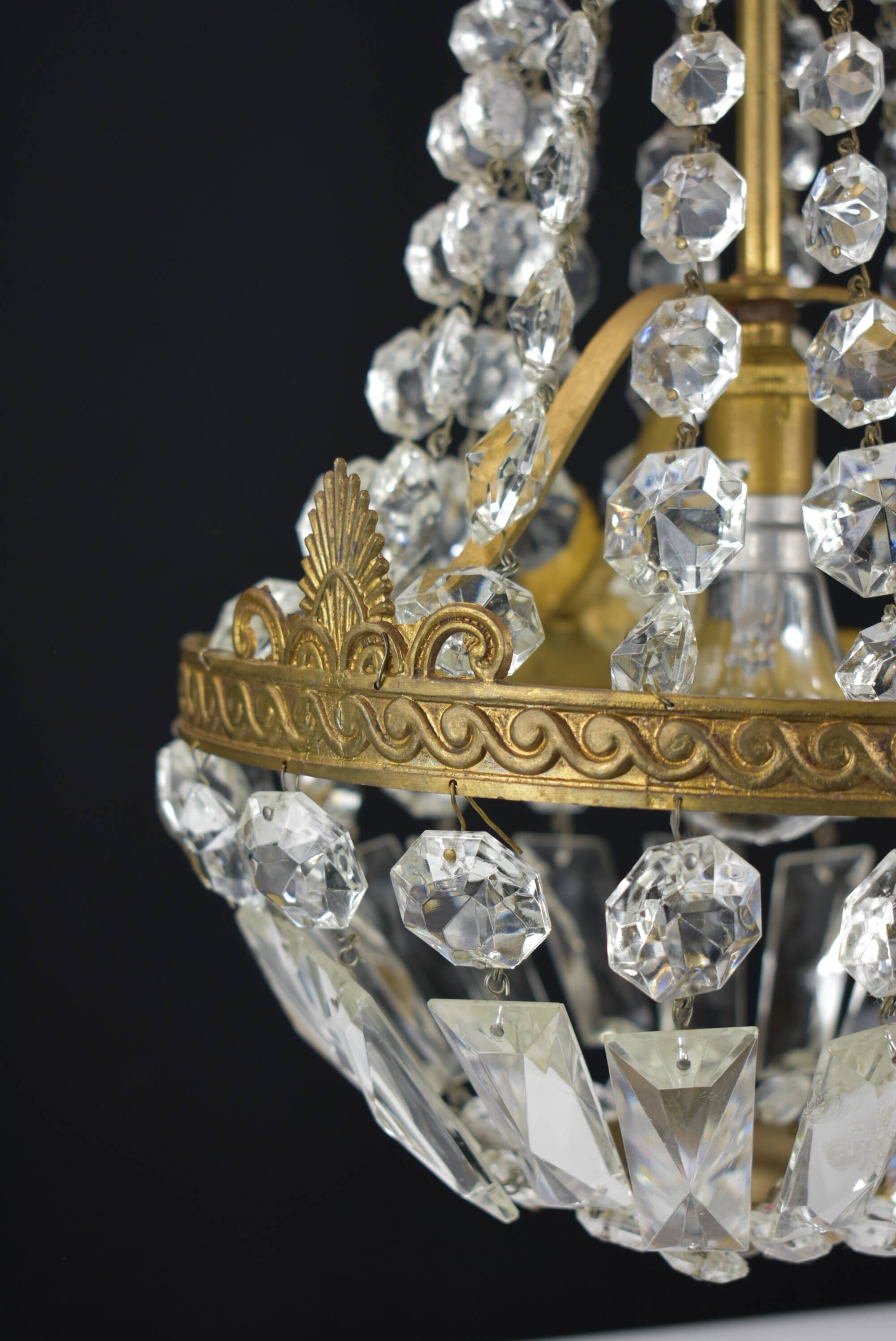 Hot air balloon chandeliers with glass tassels.